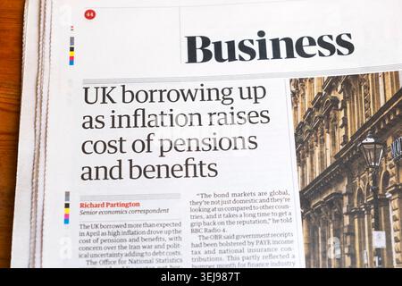 'UK borrowing up as inflation raises cost of pensions and benefits' Guardian newspaper headline Business article 23 May 2026 London UK Stock Photo