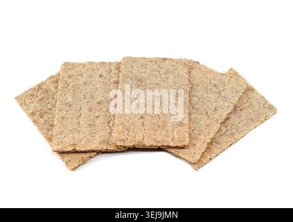 Crispy slices of wholemeal rye bread on a white background. Stock Photo