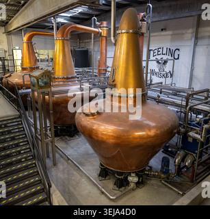 Dublin Ireland - 11 Oct 24: Interior view of copper pot stills and pipework at Teeling Whiskey Distillery in Dublin, Ireland. Stock Photo