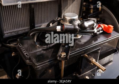 Detailed shot of black electrical hardware and wiring in a technical industrial environment Stock Photo