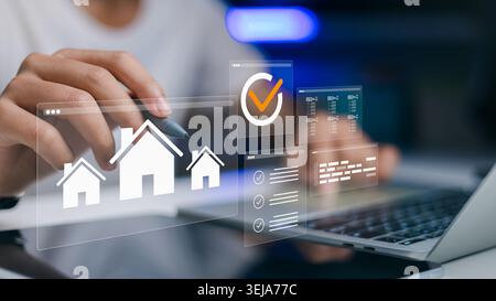 Businessman hand using stylus to browse real estate property listings on virtual interface. Concept of online house hunting, home investment, and digi Stock Photo