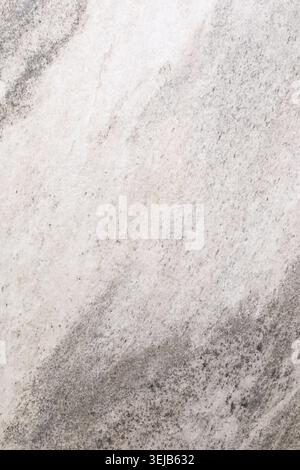 Surface features a natural marble texture with elegant gray and white veining. Ideal for countertops, flooring, and design elements in homes and busin Stock Photo