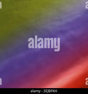 Vivid abstract gradient with blurred color transitions in green, purple, and red hues Stock Photo