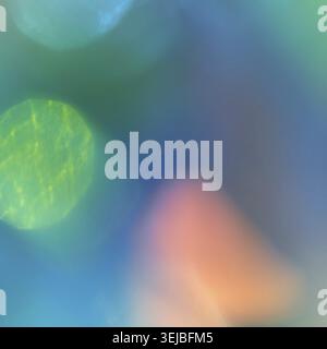 Abstract colorful bokeh with blurred shapes in blue and green tones Stock Photo