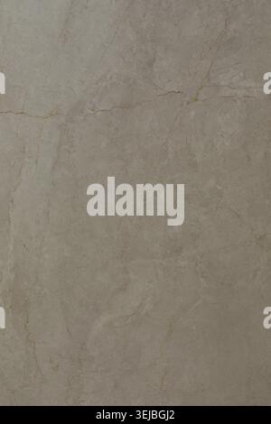 The scene showcases a smooth beige stone surface featuring soft variations in color and texture. This natural material adds elegance and simplicity to Stock Photo