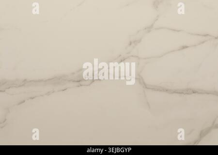 Smooth white marble with soft gray veins provides a stylish surface for various design applications. Ideal for countertops, flooring, and elegant inte Stock Photo