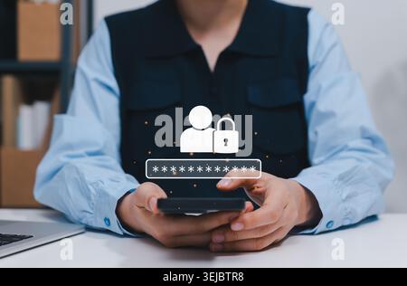 Cybersecurity and data privacy concept. Person using smartphone showing virtual user login icon, secure padlock, and password field for access Stock Photo