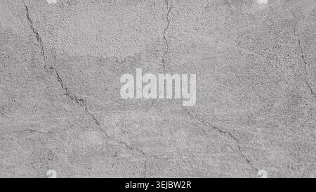 Gray cracked concrete wall texture background with rough plaster surface Stock Photo