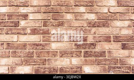 Beige brick wall texture background with rustic brick pattern Stock Photo