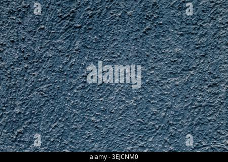 Close Up of Dark Blue Rough Textured Wall Stucco Background Stock Photo