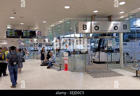 Passengers at Manchester Coach Station ticket gates on Chorlton Street, Manchester, England, UK. Stock Photo