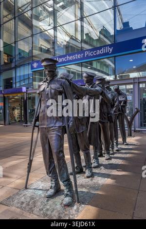 Victory Over Blindness sculpture of first world war soldiers by Johanna Domke-Guyot outside Manchester Piccadilly train station Stock Photo