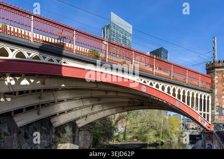 Victorian iron railway bridge over the Rochdale  canal near Castlefield Basin in Manchester, Uk Stock Photo