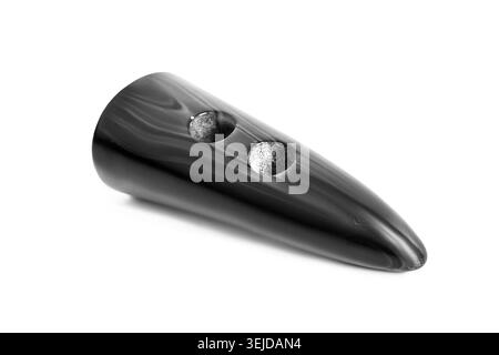 Large black clothes button lying on white background Stock Photo