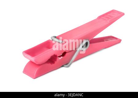 Pink plastic clothespin lying on white background Stock Photo