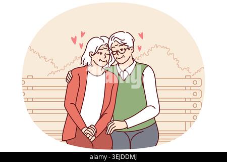 Elderly couple in love sits on park bench hugging and enjoying happy family life Stock Photo