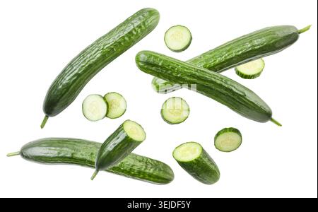 Cucumber whole and slices fly close-up on a white background. Isolated Stock Photo