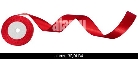 A spool with a red silk ribbon on a white isolated background Stock Photo