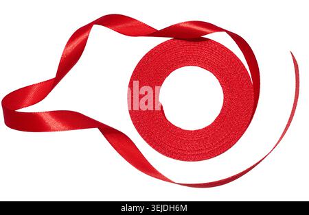 A spool with a red silk ribbon on a white isolated background Stock Photo