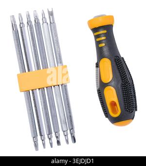 Set of metal screwdriver bits and handle on isolated background Stock Photo