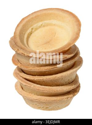 Stack of empty tartlets for salads and filling on isolated background Stock Photo