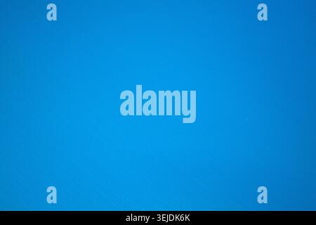 Abstract bright blue textured wall background Stock Photo