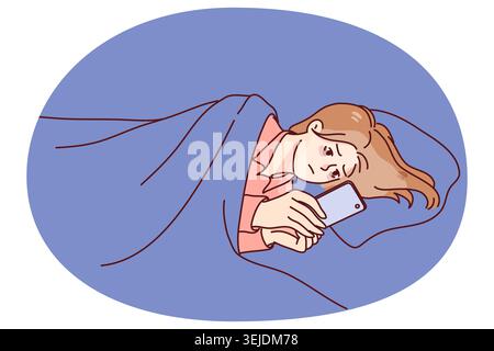 Woman lying in bed at night using cellphone Stock Photo