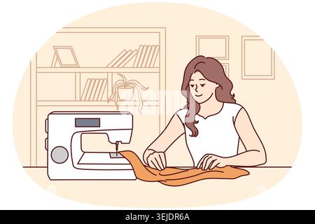 Happy woman sewing on machine at home Stock Photo