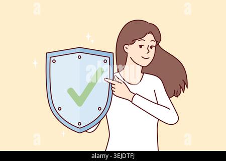 Woman with metal shield demonstrates that is protected from viruses. girl points finger at checkmark symbolizing web security using social networks an Stock Photo