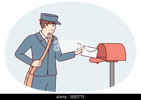 Man in postman uniform throws paper letter into metal mailbox located on street Stock Photo