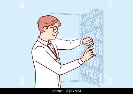 Man system administrator sets up server equipment and connects wires to switches in hosting company Stock Photo