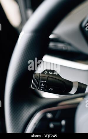 Steering wheel and headlight control lever. High quality photo Stock Photo
