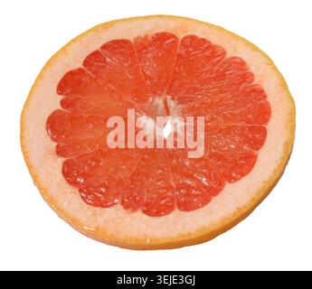 A slice of ripe grapefruit on an isolated background Stock Photo