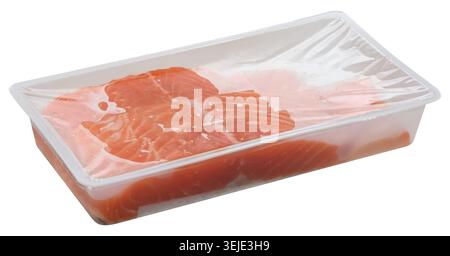 Slices of raw salmon fillets are packaged in a clear plastic tray, sealed with transparent film. Isolated background Stock Photo