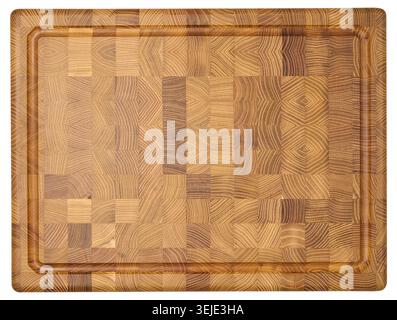Top down view of a rectangular wooden cutting board made of end grain construction, showcasing a mosaic of wood patterns Stock Photo