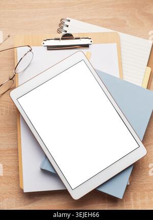 Tablet pc  and notebooks  on the office desk Stock Photo