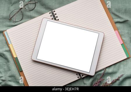 Tablet pc  and notebooks  on the office desk Stock Photo