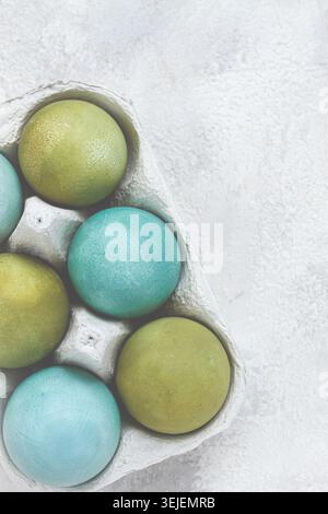 Easter colored eggs, in green and turquoise tones, Easter card, top view, no people, Stock Photo