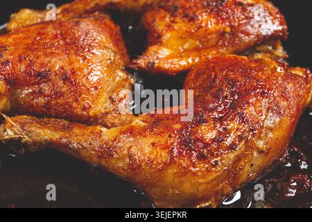 Baked chicken legs, with crispy skin, served in a pan, rustic style, homemade, no people, Stock Photo