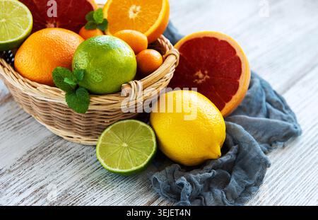 Basket with citrus fresh fruits Stock Photo