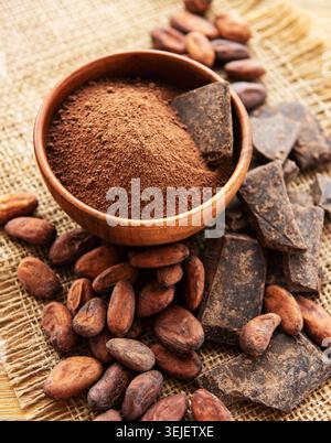 Cocoa powder and beans Stock Photo