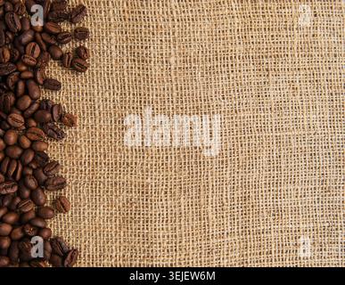 Coffee beans on a rough sacking Stock Photo
