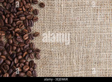 Coffee beans on a rough sacking Stock Photo