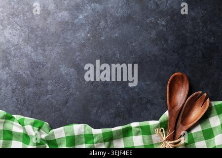 Kitchen table with towel and utensil Stock Photo
