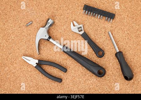 Set of tools on cork background Stock Photo