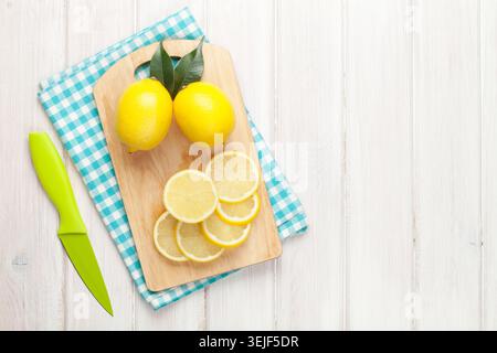 Sliced lemon on cutting board Stock Photo