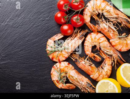 Grilled shrimps on stone plate Stock Photo