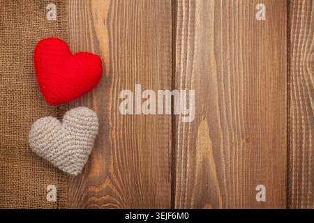 Valentines day background with handmade toy hearts Stock Photo
