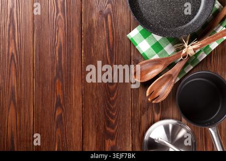 Cooking utensil on wooden table Stock Photo