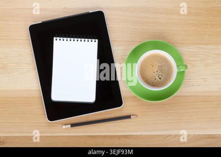 Touch screen tablet computer, notepad, pencil and cup of coffee Stock Photo